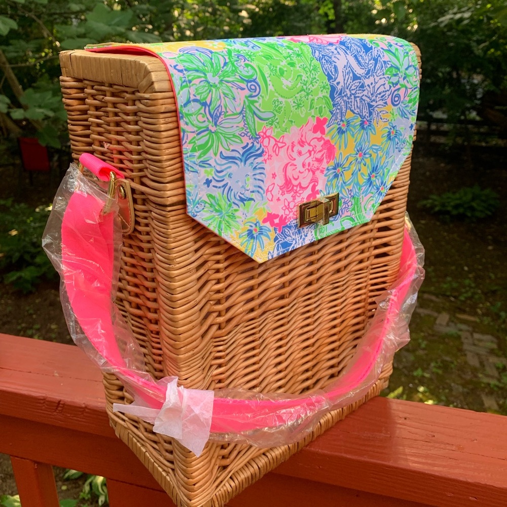 New/never used Lilly Pulitzer wicker and floral wine tote.